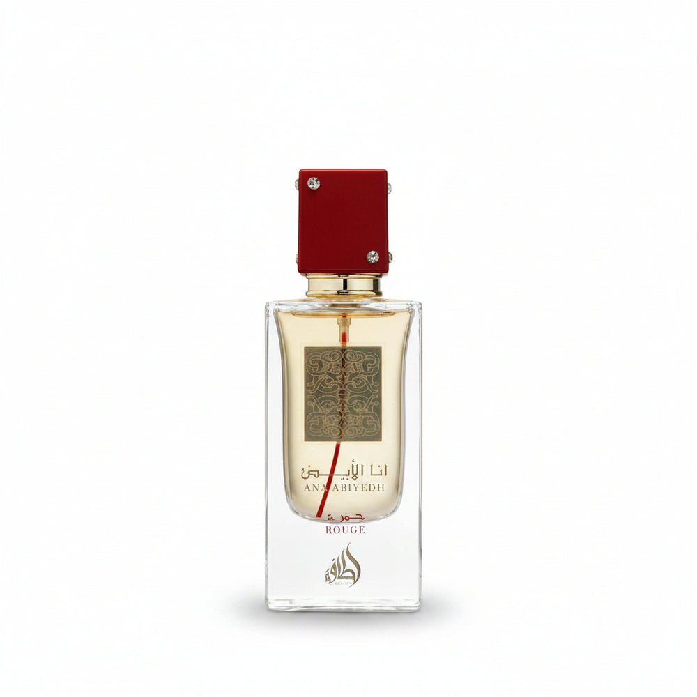 Perfume bottle with red cap and gold accents on a white background