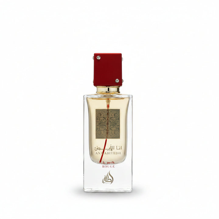 Perfume bottle with red cap and gold accents on a white background