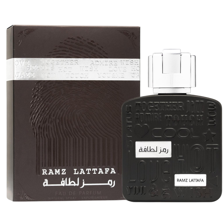 Lattafa Ramz Silver EDP 100ml perfume bottle and box – elegant fresh citrus woody fragrance with top notes grapefruit pineapple lemon, heart of lavender cedarwood patchouli, base of amber tonka bean musk vanilla