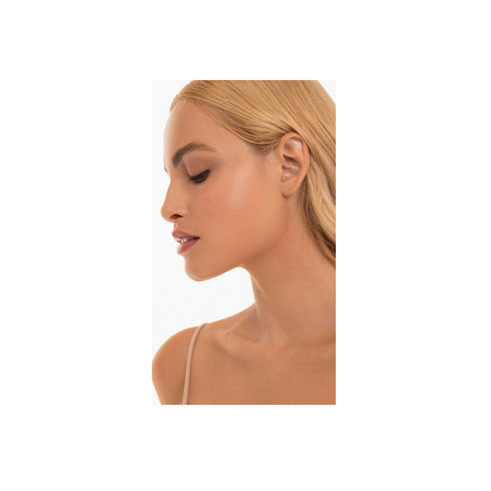 Model side face view wearing Cheri Up Believe It Primer – flawless smooth skin ready for makeup application