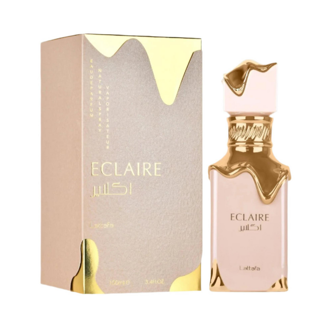 Lattafa Eclaire EDP 100ml perfume bottle and box slight side angle – rich long lasting sweet gourmand scent with caramel almond milk, vanilla jasmine praline, tonka bean sandalwood amber musk