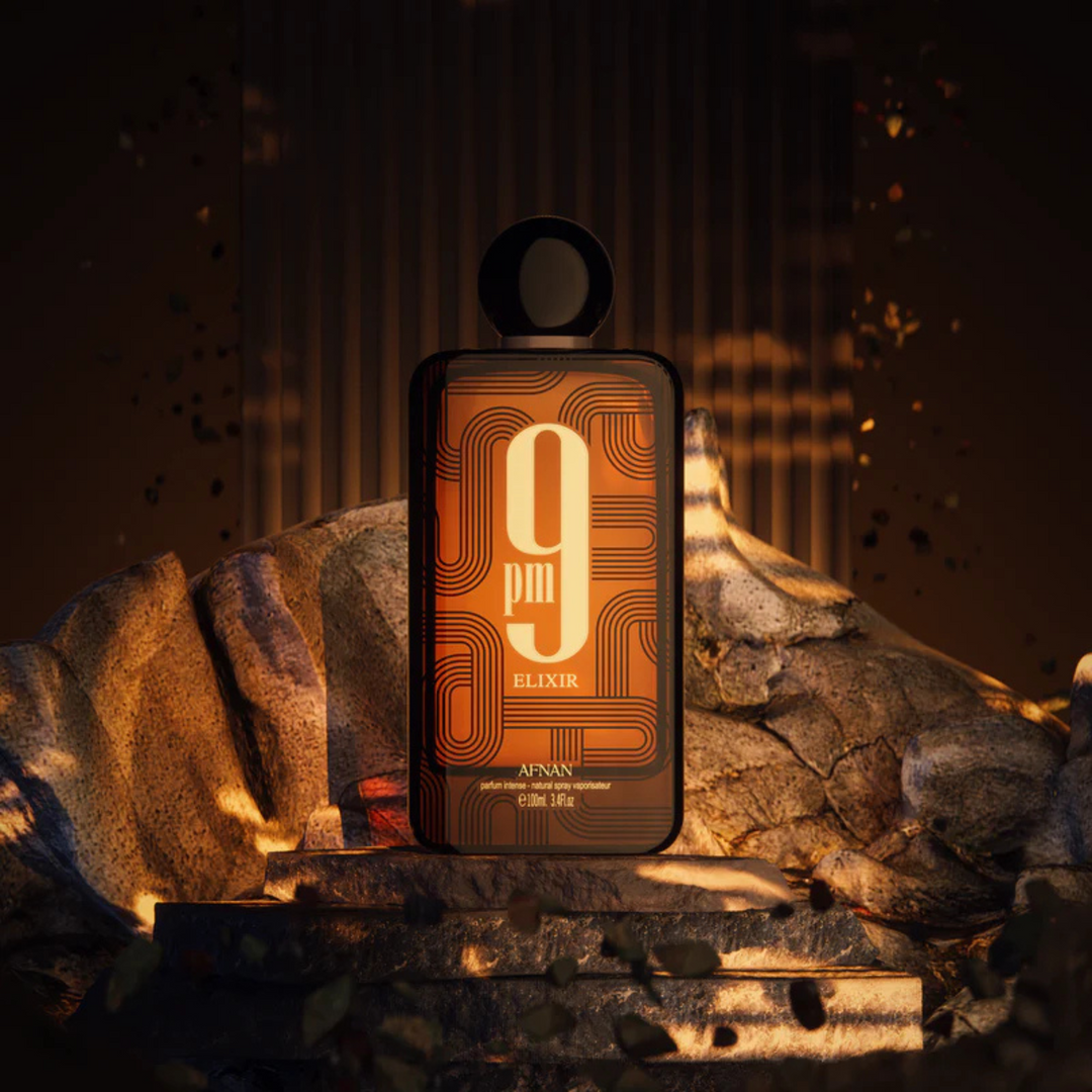 Afnan 9PM Elixir EDP 100ml perfume bottle straight front view on brown stone background – elegant long lasting sweet spicy masculine fragrance