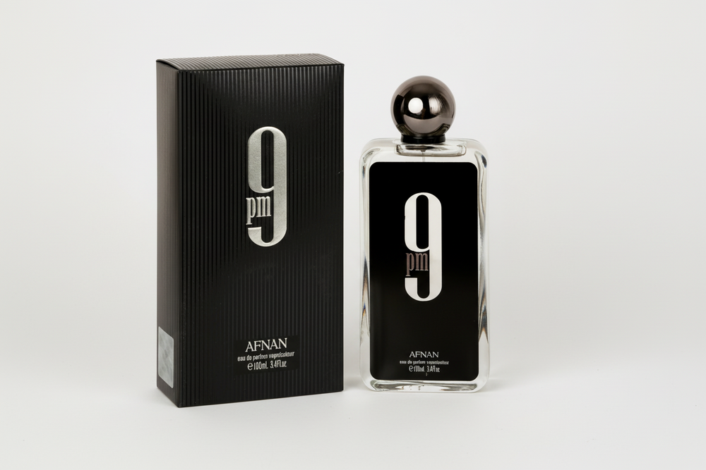Afnan 9PM EDP 100ml perfume bottle and box slight side angle – rich warm sweet spicy scent for men