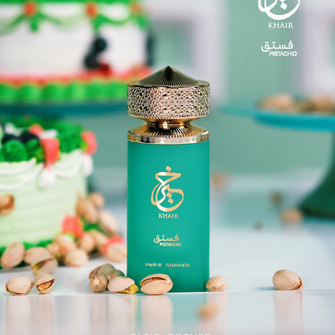 Paris Corner Khair Pistachio EDP 100ml perfume bottle straight front view on glossy counter with pistachio nuts – rich sweet gourmand pistachio fragrance with cardamom bergamot almond jasmine vanilla tonka bean amber sandalwood