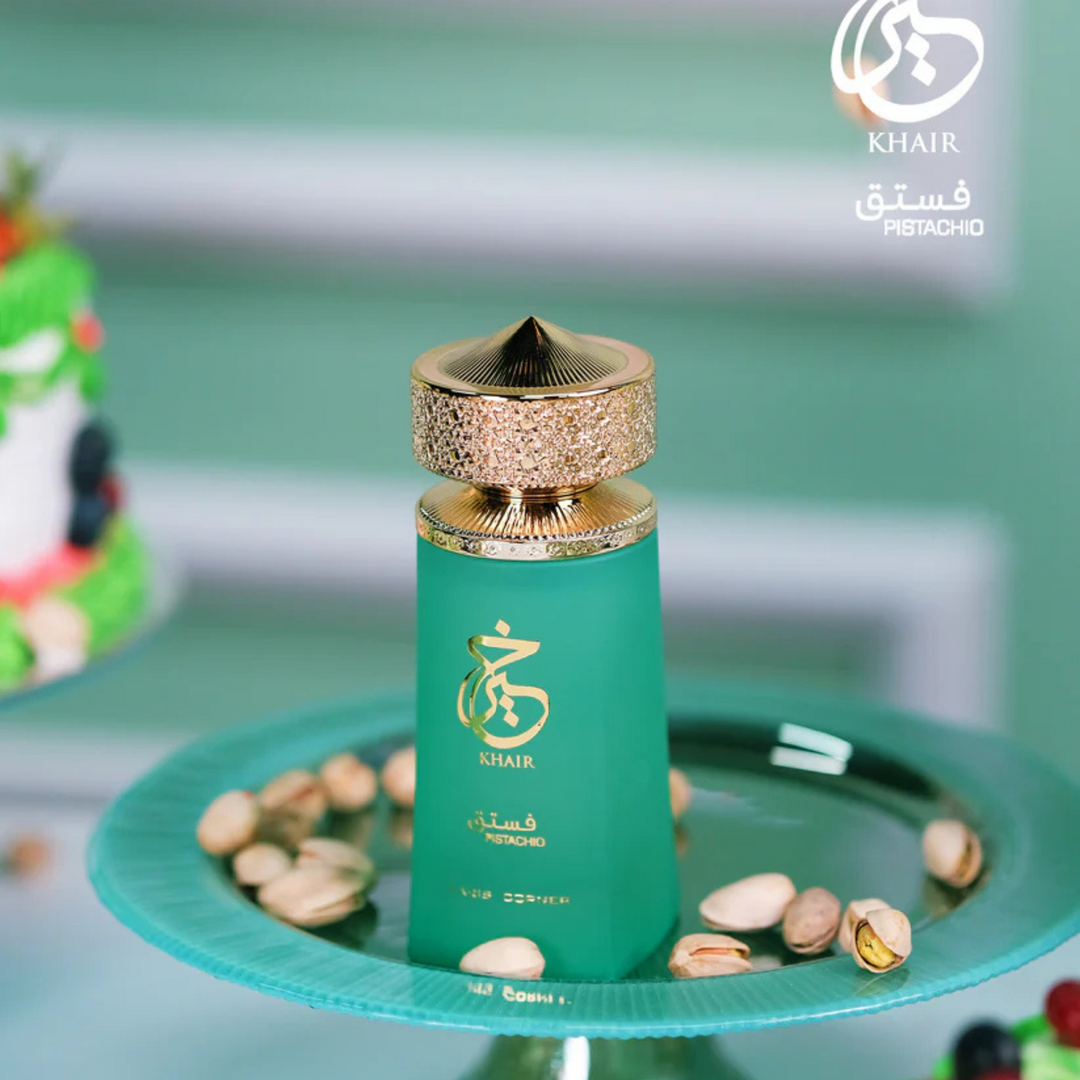 Paris Corner Khair Pistachio EDP 100ml perfume bottle straight front view on green tray with pistachio nuts – elegant sweet gourmand pistachio fragrance with pistachio cardamom bergamot, almond jasmine heliotrope, vanilla tonka bean amber sandalwood