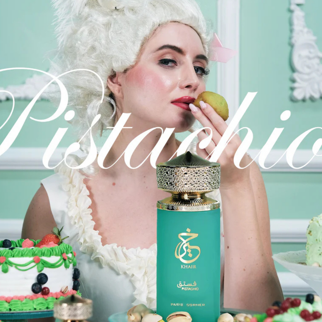 Paris Corner Khair Pistachio EDP 100ml perfume bottle front view with woman in white clothes and white hat background text Pistachio – stylish gourmand pistachio scent with pistachio cardamom bergamot, almond jasmine heliotrope, vanilla tonka bean amber sandalwood