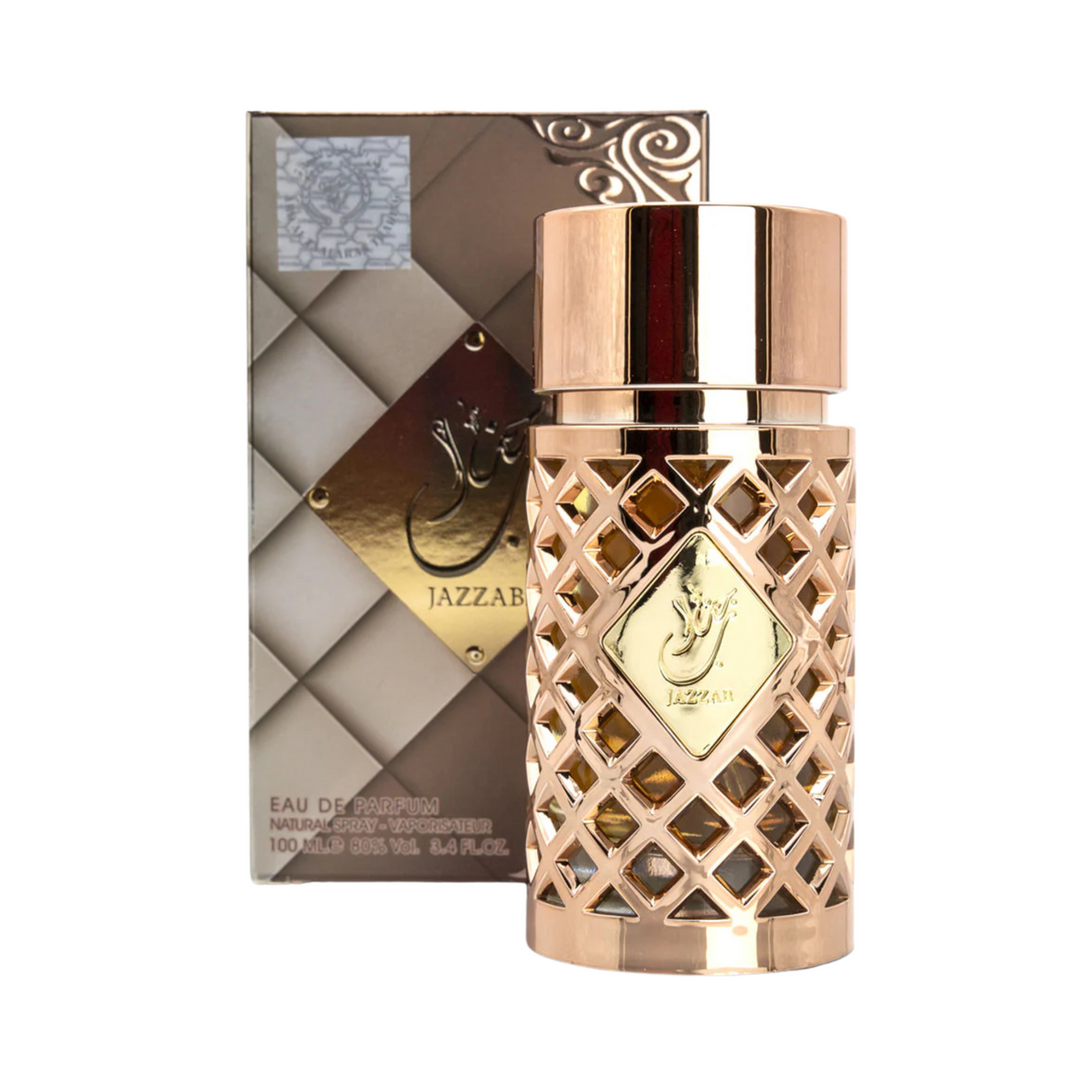 Ard al zaafaran jazzab gold Rose gold perfume bottle with decorative packaging on a white background