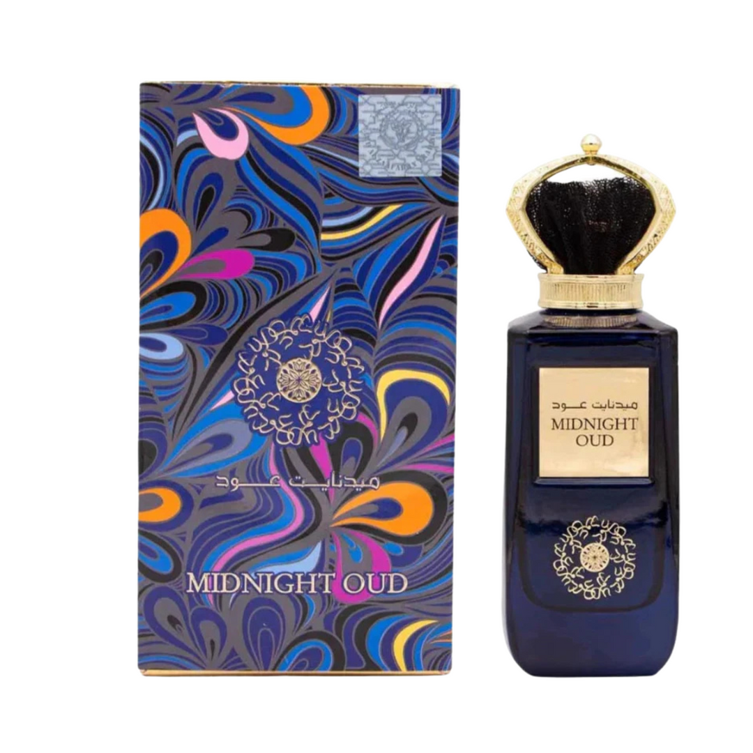Perfume bottle and packaging of Ard al zaafaran 'Midnight Oud' with intricate design on a white background