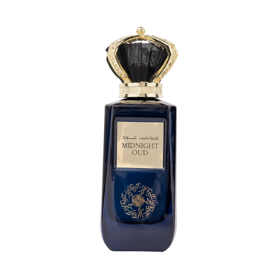 Perfume bottle labeled Ard al zaafaran 'Midnight Oud' with a decorative cap on a white background