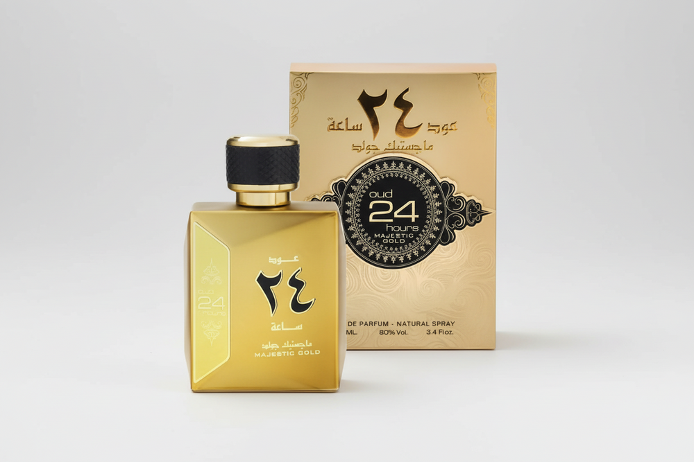 Ard Al Zaafaran Oud 24 Hours Majestic Gold Gold perfume bottle and packaging with Arabic text on a white background