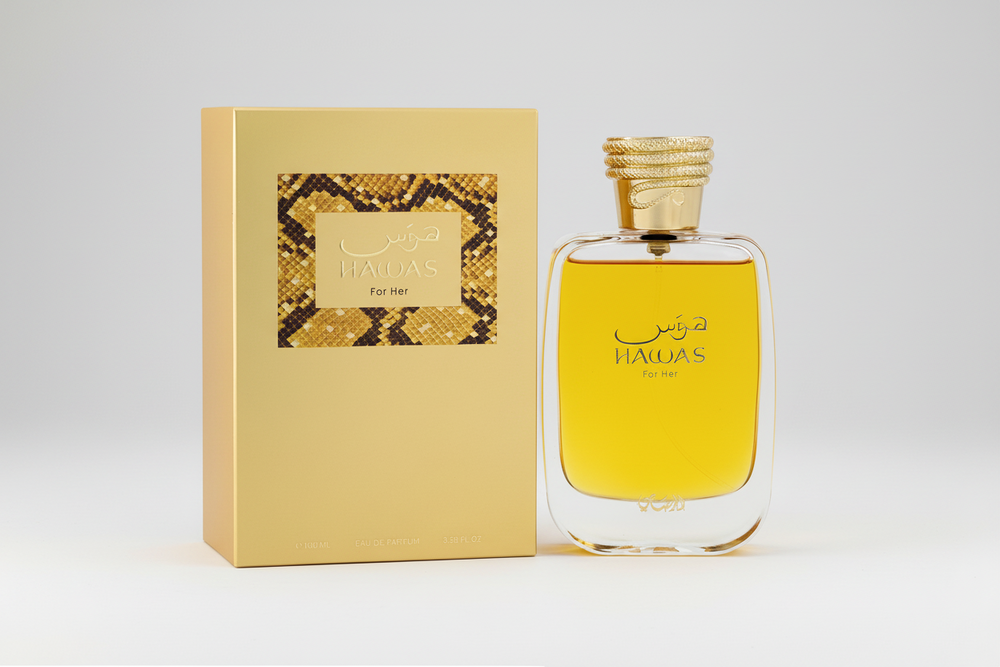 Perfume bottle and packaging of 'Hawas' for her on a white background
