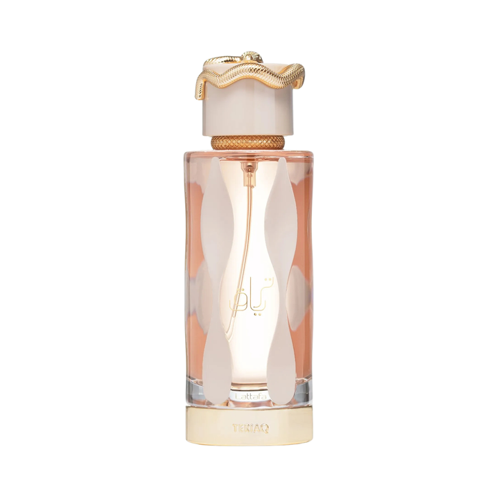 Perfume bottle with gold cap and decorative design on a white background