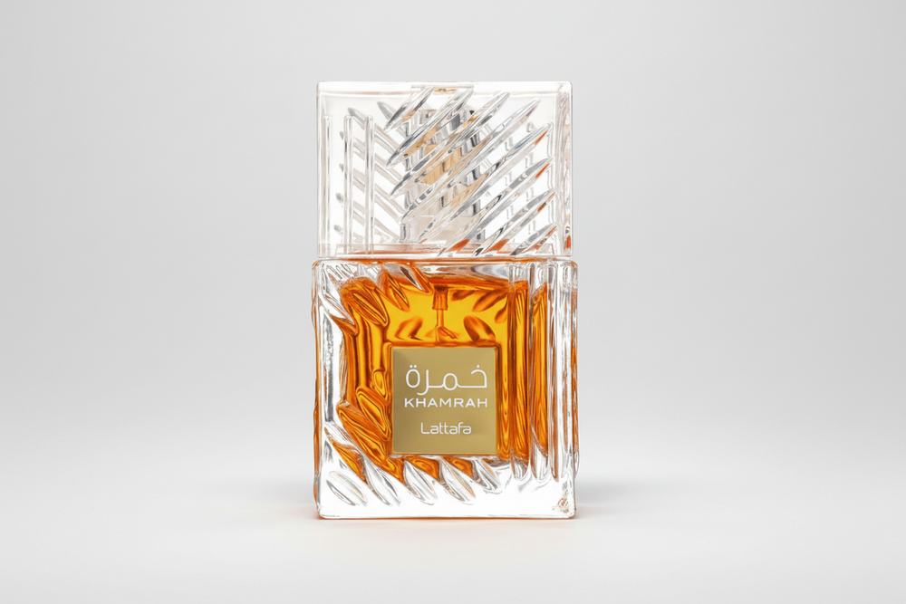 Perfume bottle with intricate design on a light gray background