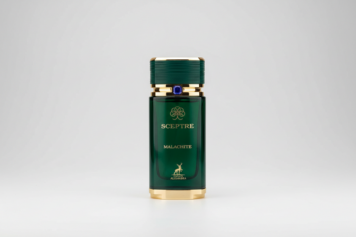 Green bottle with gold cap on a gray background