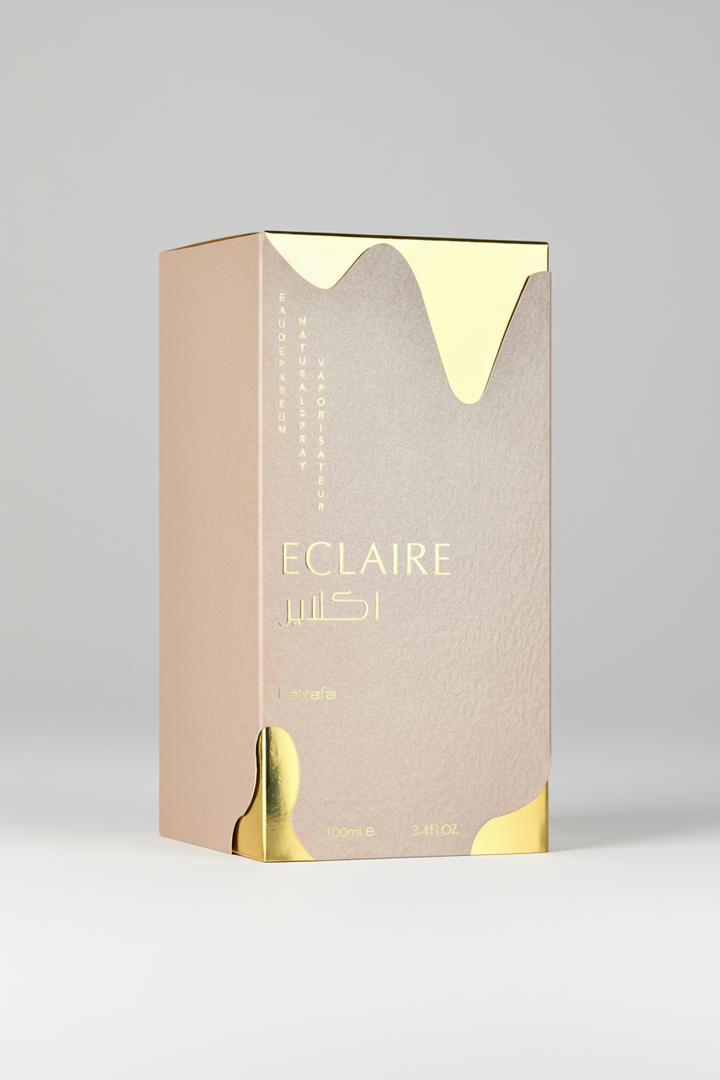 Eclaire perfume box with gold accents on a white background
