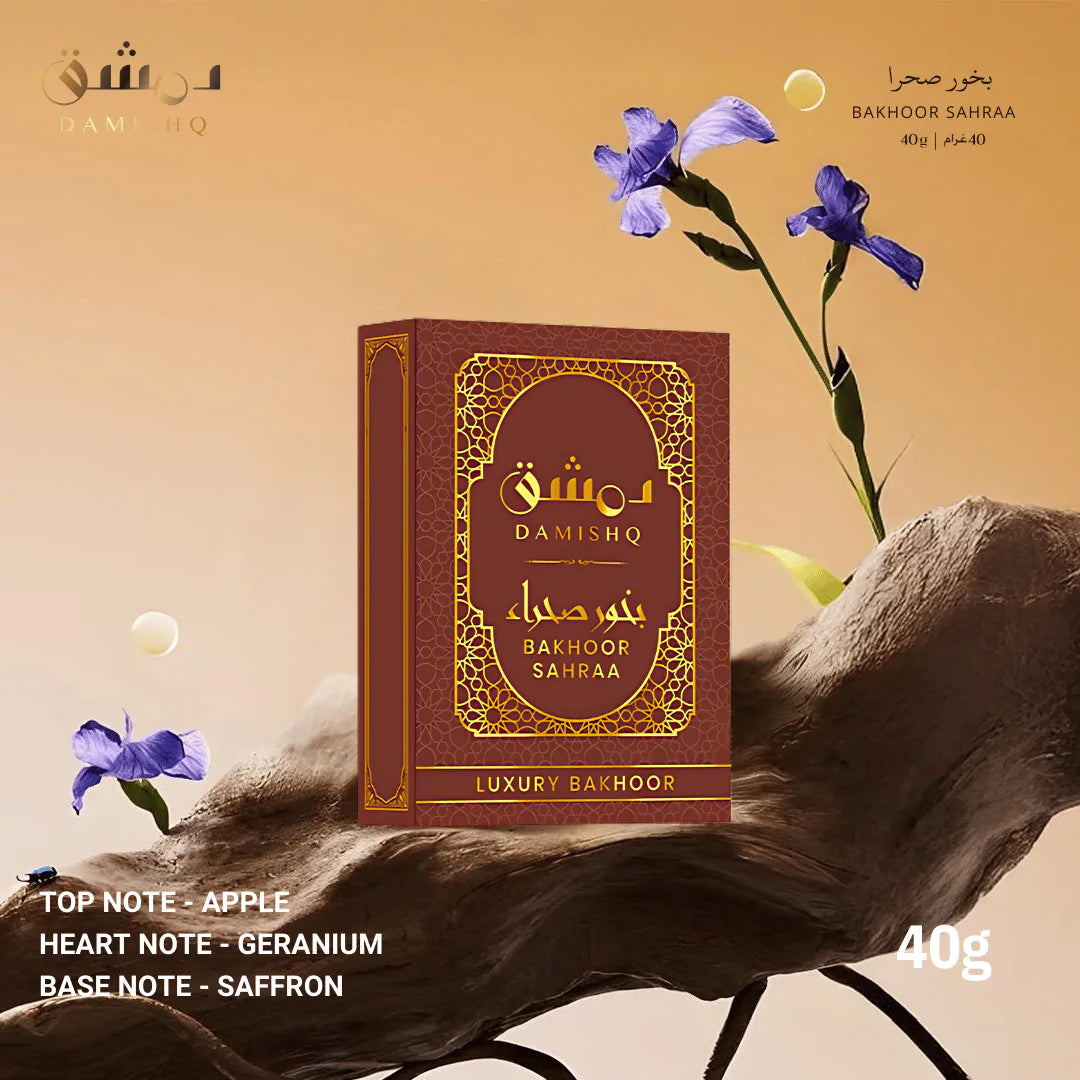 Damishq Bakhoor Sahraa box on tree trunk with text top notes apple, heart note geranium, base notes saffron – rich oriental floral woody home fragrance