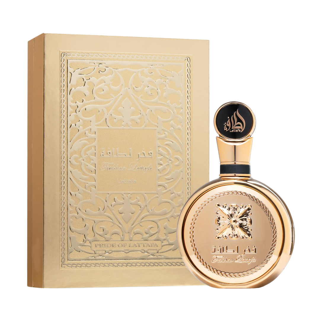 Lattafa Fakhar Extrait EDP 100ml perfume bottle and box – luxurious oriental woody fragrance with top notes bergamot pink pepper saffron, heart of rose jasmine patchouli, base of amber musk sandalwood vanilla
