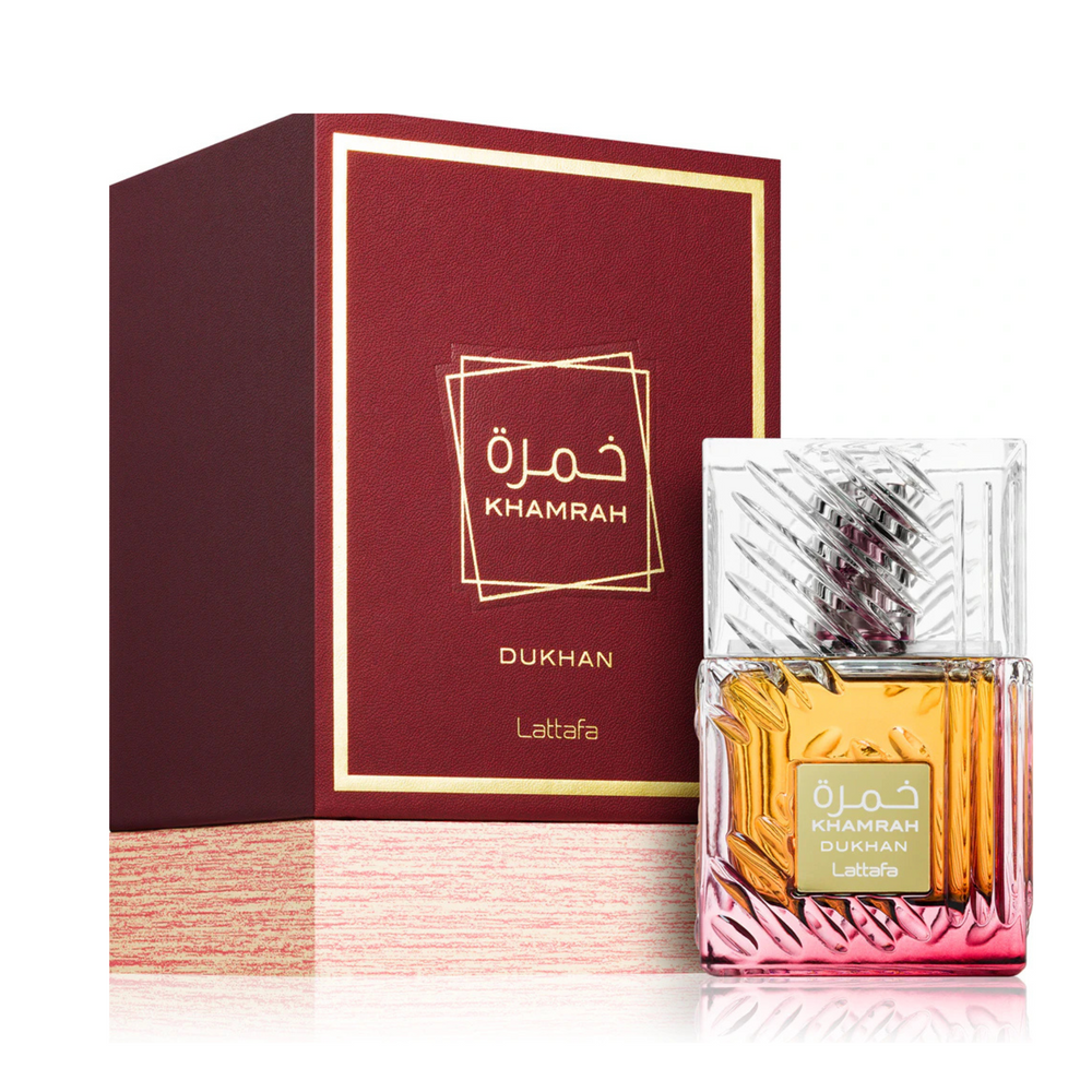 Lattafa Khamrah Dukhan EDP 100ml perfume bottle and box slight side angle – deep long lasting warm spicy gourmand scent with cinnamon nutmeg bergamot, praline dates tuberose, vanilla tonka bean benzoin amberwood myrrh
