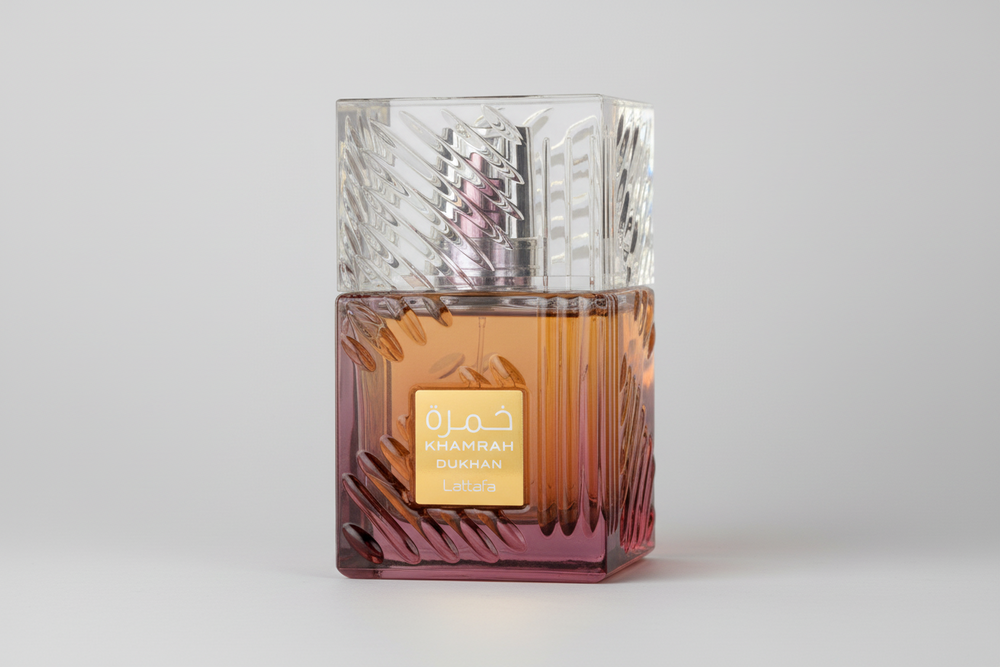 Lattafa Khamrah Dukhan EDP 100ml perfume bottle slight side angle – elegant warm spicy gourmand fragrance with cinnamon nutmeg bergamot, praline dates tuberose, vanilla tonka bean benzoin amberwood myrrh