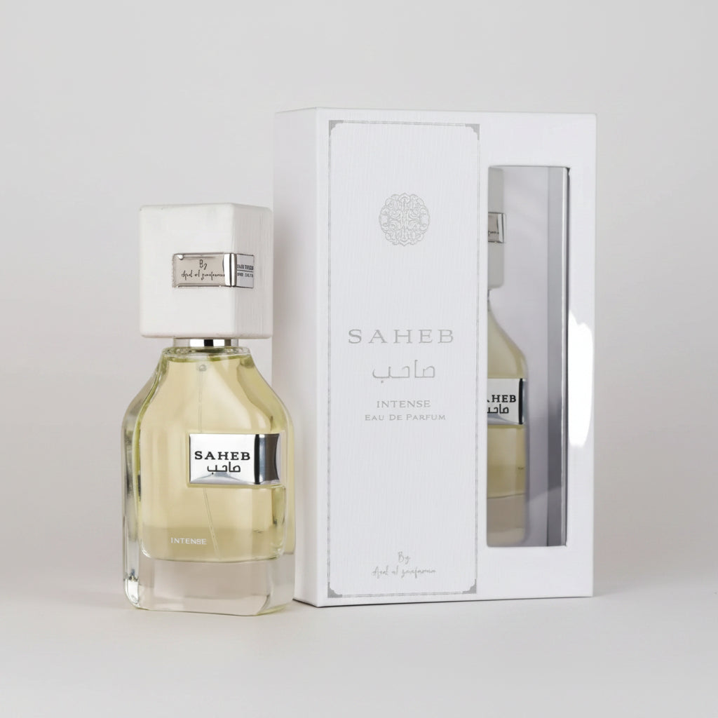 A bottle of Sahab Intense Eau de Parfum with a white cap, shown next to its white presentation box on a light gray background.