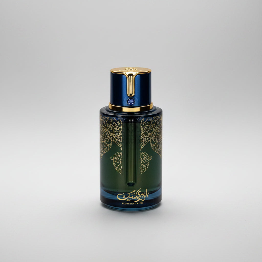 Perfume bottle with intricate designs on a white background