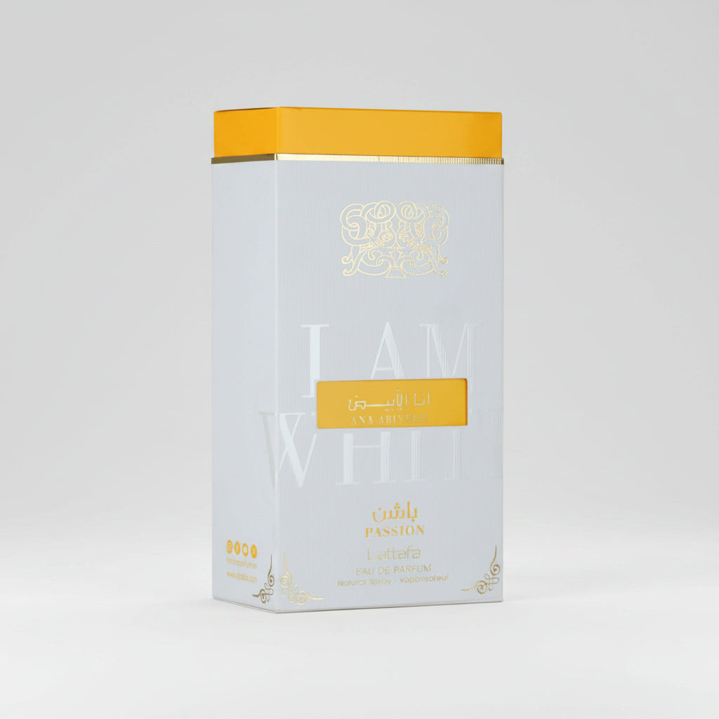 A tall rectangular perfume box with a white body, a bright yellow-orange lid, and gold decorative lettering. The front reads 'JAM WHITE' and 'PASSION' with Arabic text, shown on a plain white background.
