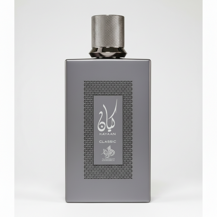 A rectangular silver-gray bottle of Kayaan Classic perfume with a textured metallic cap, shown against a plain white background.
