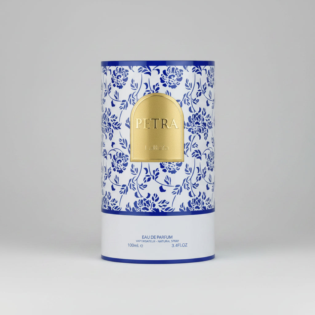 Perfume packaging with floral design and 'Petra' branding on a white background