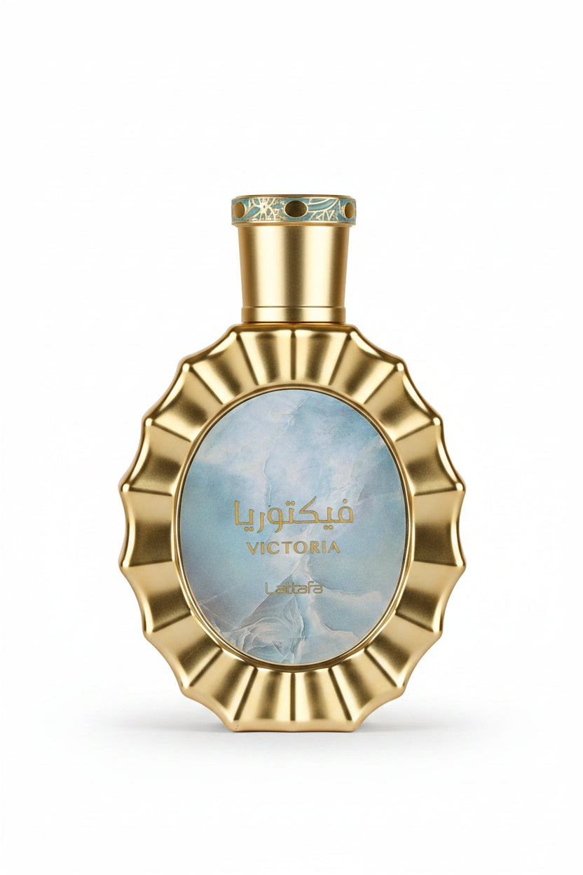 Gold perfume bottle with 'Victoria' label on a white background
