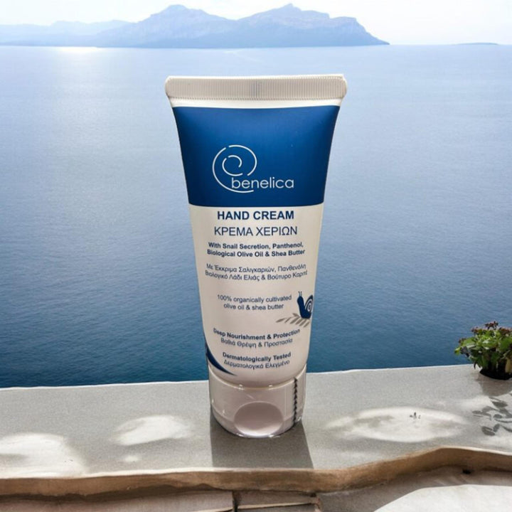 Benelica VPA Hand Cream straight front view tube with sea background – hydrating protective hand cream with snail secretion and shea butter for silky healthy hands