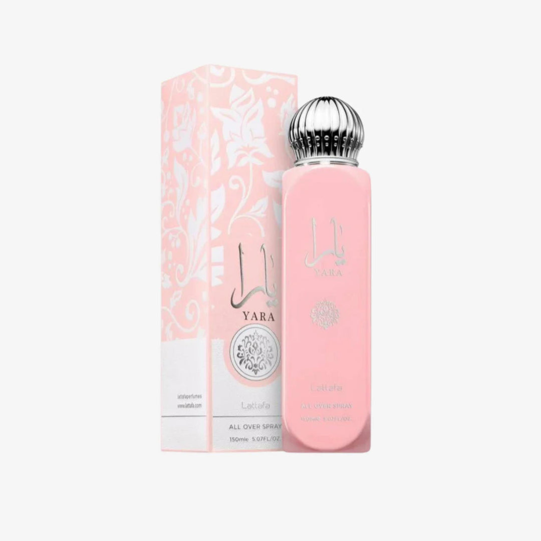 Pink spray bottle with silver top and matching packaging on a white background